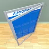 Информационный стенд с дверцей, с карманами на 9 листов А-4